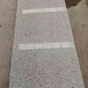 石嘴山芝麻白光面毛板