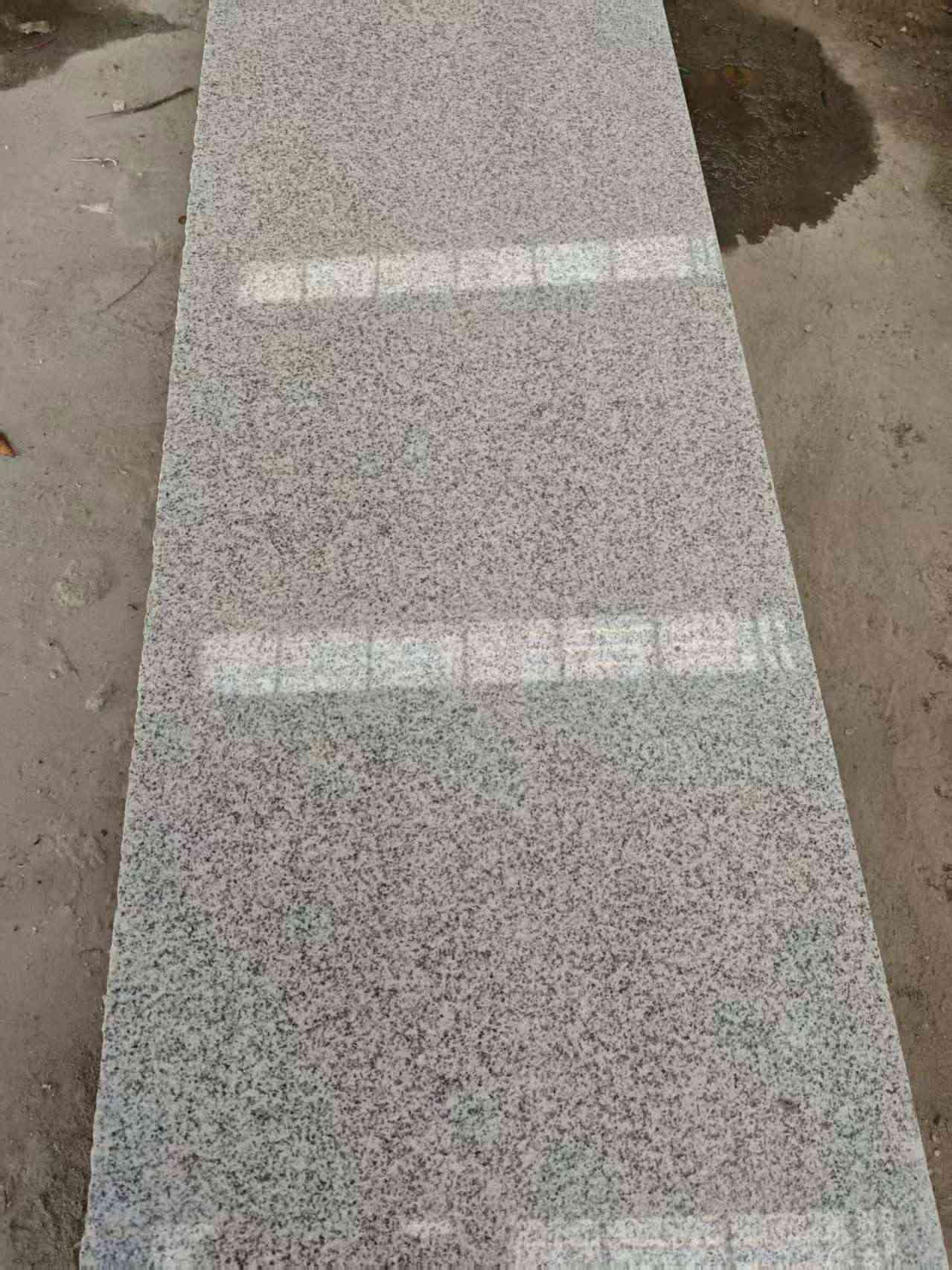 石嘴山芝麻白光面毛板